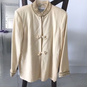 Cream suit with sophisticated bead detail